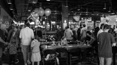 PEOPLE ATTENDING A BIRTHDAY PARTY AT THE ICE RINK