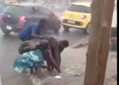 Woman being rescued at Nima