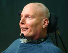 Actor Christopher Reeve smiles during a question and answer period following his talk at the Yale University School of Medicine in New Haven, Conn., Thursday, April 3, 2003. Reeve, who was paralyzed in a horse riding accident, spoke to the Yale University Stem Cell Interest Group.  (AP Photo/Bob Child)