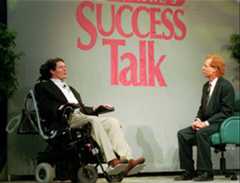 Actor Christopher Reeve answers questions posed to him by Peter Lowe, right, at the Success 1996 Seminar Thursday, April 18, 1996 in Atlanta. The Success Seminar is a day-long smorgasbord of revered and admired figures sharing their secrets for success. Since his accident in an equestrian competition in May of 1995, Reeve has been active in raising public awareness about spinal cord injuries and in obtaining increased funding from both the public and private sector to effect a cure. (AP Photo/Leita Cowart)