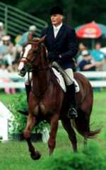 Christopher Reeve rides in an equestrian event,  in Gladstone, N.J., in 1994. Reeve died Sunday, Oct. 10, 2004,  of complications from an infection caused by a bedsore. Reeve suddenly became the face of spinal cord injury after his May 1995 horse riding accident. (AP Photo/Daniel Hulshizer, File)