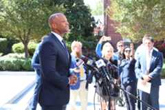 Gov. Wes Moore stands in front of microphones outside the Annapolis State House. Capital News Service Photo by Aline Behar Kado.