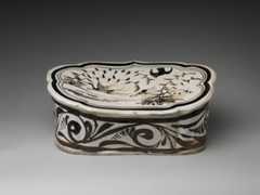 Pillow with a falcon attacking a swan, Stoneware painted with brown and black pigment on white slip under transparent glaze (Cizhou ware), China