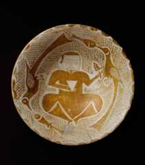 Bowl depicting a Man holding a Cup and a Flowering Branch, Earthenware; luster-painted on opaque white glaze