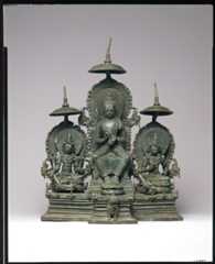 Enthroned Buddha Attended by the Bodhisattvas Avalokiteshvara and Vajrapani, Bronze, Indonesia (Java)