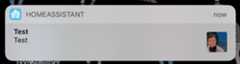 An unexpanded push notification with an attachment.