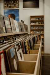 A record store bin full of records