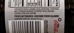 Phenylketonurics warning on bottle of Diet Coke.