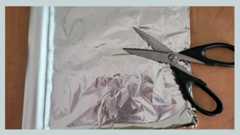 aluminum foil with kitchen shears / scissors