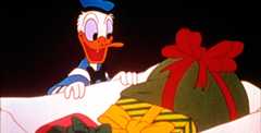 Scene of Donald Duck opening present in Disneyland TV show A Present for Donald