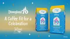 Promotional image for Joffrey's Coffee & Tea Company's Disneyland Resort 70th Anniversary Blend. The design features two blue coffee bags labeled with details like '70th Anniversary Blend,' 'Dark Roast,' and tasting notes of chocolate with a subtle sweet finish. The background has a starry gradient from blue to yellow, with celebratory text reading 'Disneyland Resort 70' and 'A Coffee Fit for a Celebration.'