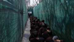 Iraqi security forces lead suspected Islamic State militants for questioning, after they were transferred from Syria to Iraq, at Al-Karkh Central Prison in Baghdad, Iraq, Thursday, Feb. 12, 2026. (AP)