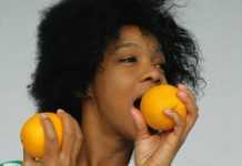 Woman eating fruits