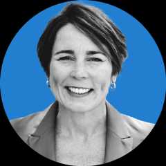 Headshot of Massachusetts Governor Maura Healey on a blue background.