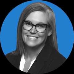 Headshot of Arizona Governor Katie Hobbs on a blue background.