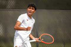 Men's Tennis player celebrates