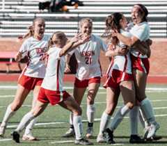 Women's soccer team celebrates