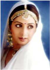 Sridevi made her Bollywood debut as the sister in Julie but quickly scored lead roles. She showed off her acting chops with a double role in Chaalbaaz and made men go weak in the knees with her sensual saree act in Mr India.