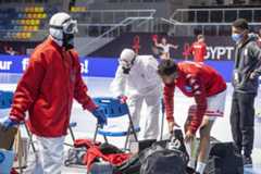 Madinat Sittah Uktubar (Egypt).- The Covid-19 lt;HIT gt;cleaning lt;/HIT gt; team at work during the 27th Men's lt;HIT gt;Handball lt;/HIT gt; World Championship 2021 Group E match betwen Austria and France in Madinat Sittah Uktubar in Egypt, 16 January 2021. (Balonmano, Egipto, Francia) EPA/