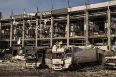 A Novus logistics center is seen damaged after a Russian strike on Kyiv