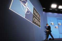 NATO Secretary General Mark Rutte leaves a media conference.