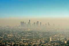 The downtown Los Angeles skyline bathed in smog. (Daniel Stein / Getty Images)