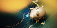 A golden piggy bank rests on a dark financial chart with colorful lines and data points. The chart features fluctuating lines indicating financial trends, while two yellow light spots create a warm glow effect on part of the scene.