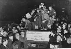 Students and members of the SA unload books deemed "un-German" during the book burning in Berlin.
