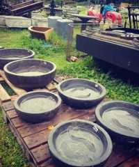 Bowls with fish carving