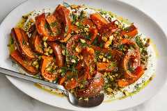 A recipe for Roasted Spiced Squash With Whipped Feta and Pistachios. Food styled by Judy Kim. (Linda Xiao/The New York Times)