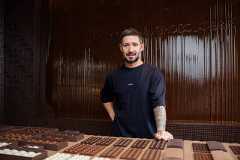 Cedric Grolet at Cedric et la Chocolaterie, his new chocolate shop in Paris, Oct. 8, 2025. (Matthew Avignone/The New York Times)