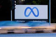 FILE PHOTO: Morning commute traffic streams past the Meta sign outside the headquarters of Facebook parent company Meta Platforms Inc in Mountain View, California, U.S. November 9, 2022.  REUTERS/Peter DaSilva/File Photo ORG XMIT: FW1