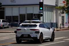 FILE PHOTO: A Waymo driverless vehicle drives through Santa Monica