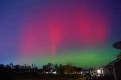 Northern Lights, also called aurora borealis, illuminate the night sky in Johnston