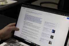 Nick Kasprowicz, general counsel for Wolf River Electric, reviews online search results showing false AI-generated claims about the solar contractor, in Isanti, Minn., on Oct. 29, 2025. (Tim Gruber/The New York Times)