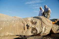People visit the remains of the archaeological site of Nimrud, which was destroyed by Islamic State militants in the Assyrian city of Nimrud, on the eastern bank of the Tigris River, outskirts of Mosul