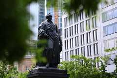 The sun rises behind the cathedral in Frankfurt