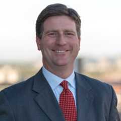 Headshot of Greg Stanton.