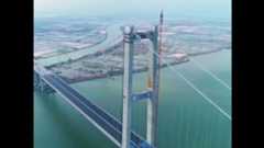 Another China megaproject - Nansha Bridge officially opens| CCTV English : The Nansha Bridge across the Pearl River estuary officially opened on Tuesday. It is the first innovative megaproject to begin service after the central government unveiled development plans for the Bay Area in February. The 12.9-km bridge has eight lanes and is designed to handle 100,000 vehicles per day, greatly easing congestion on Humen Bridge, the previous sole crossing at the mouth of the Pearl River.