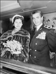 Mohammad Reza Pahlavi, the Shah of Iran, and his wife Empress Soraya pose for the media in Tehran in March 1953.