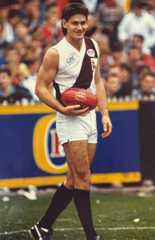 One of the two 1990 Premiership medals awarded to Gavin Crosisca, and now donated to Collingwood