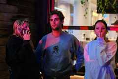 Members of the public look at the scene at Bondi Beach after a mass shooting on December 14, 2025 in Sydney, Australia.