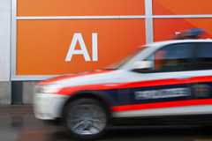 An artificial intelligence AI sign at the Cloudflare house pavilion ahead of the World Economic Forum (WEF) annual meeting in Davos, Switzerland, on Sunday, Jan 18, 2026.