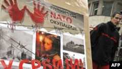 A poster in Belgrade marks the 10th anniversary of the NATO bombing campaign against Serbia.