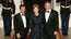 President George W. Bush and Mrs. Laura Bush stand with President Nicolas Sarkozy of France on the North Portico of the White House after his arrival for dinner Tuesday, Nov. 6, 2007.