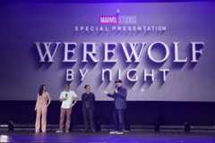 Giacchino flanked by his stars, and Kevin Feige, at D23 Expo.