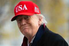 President Donald Trump arrives on the South Lawn of the White House on November 22, 2025 in Washington, DC.