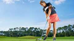 Turn your rib cage as you open your hips. The towel won’t fall, and the ball will rocket off the clubface.