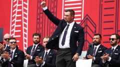 Bryson DeChambeau of Team United States acknowledges the crowd during the opening ceremony for the 2025 Ryder Cup at Black Course at Bethpage State Park Golf Course on September 24, 2025 in Farmingdale, New York.