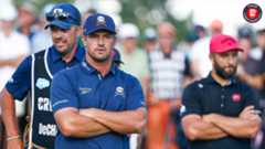 Bryson DeChambeau and Jon Rahm look on during LIV Michigan